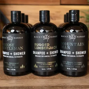 Mens shampoo and shower gel products. Woodsy Gentleman, Rugged Lumberjack, and Mountain Man.