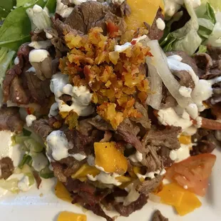 Tri Tip Steak (Prime Omaha Nebraska) on a Mixed Greens Salad.  Available as a meal too