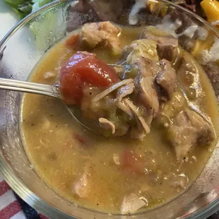 A house speciality - from scratch, Colorado Style Pork Green Chile - light broth with tender chunks of Duroc pork. Delicious, with a kick