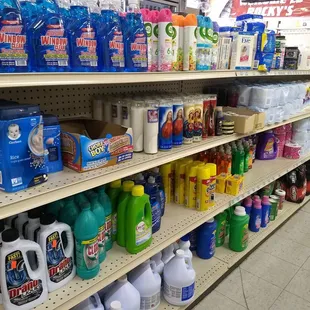 Assorted household goods like detergent, air freshener, bleach