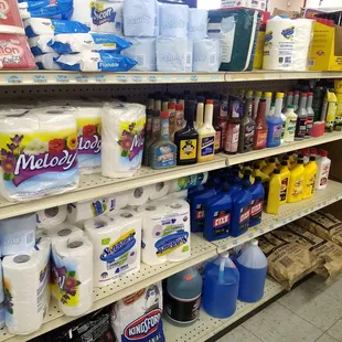 Basic auto supplies mixed in with paper goods, baby wipes, and charcoal