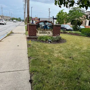 a sign on the side of the road