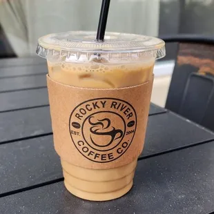 a cup of coffee on a table