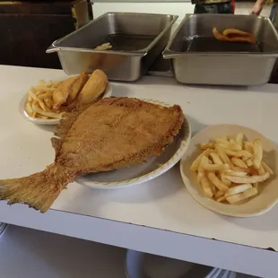 This is what we call a &quot;Tailgate&quot; Whole Flounder.  Why?  Because we&apos;ve been told it is the size of a tailgate on a small pick-up truck.