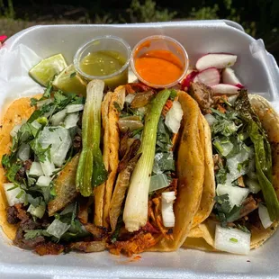 Campechana, chicken and pork tacos