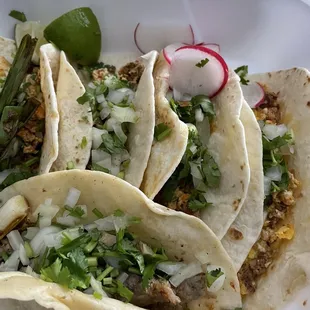 4 chorizo and eggs tacos &amp; 1 carnitas