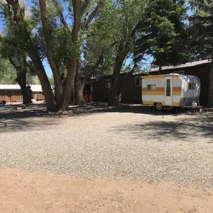 View of the spot where we stayed next to that decorative rustic RV with the Arkansas river behind us.