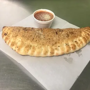 Indulgence yourself with a Calzone with 3 Toppings of your choice.