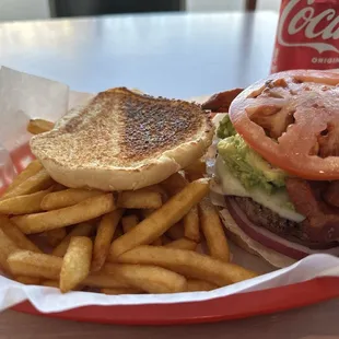 Guacoburger with jack cheese, bacon &amp; side of fries.