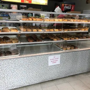 a woman standing in front of the counter