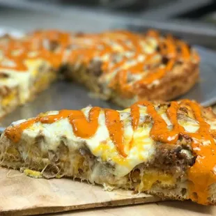 a slice taken out of the pizza