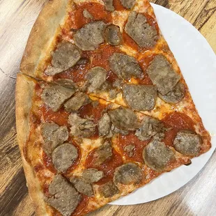 a slice of pepperoni pizza