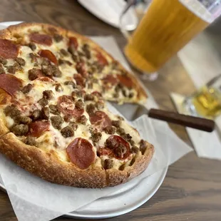 Medium pizza 2 toppings  (Pepperoni and sausage)