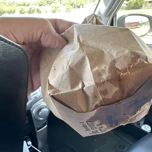 The balled up greasy bag