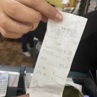 You can lightly see the penciled in total that the employee decided to edit herself