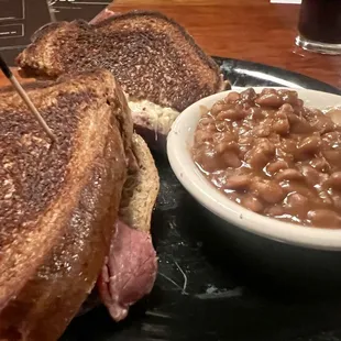 Rueben sandwich and baked beans.