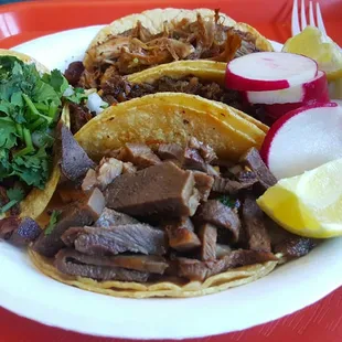 Tacos!! Lengua up front, cabeza in the middle, carnitas in the back. And pastor to the left.