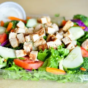 a salad in a plastic container