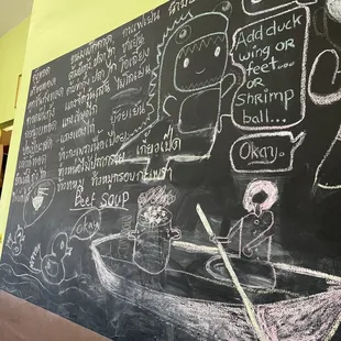 Thai menu on the wall. Rodded is famous for their Duck Noodle Soup.
