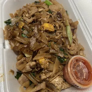 Pad See Eww. Great wok smoky flavor. They use thinner rice noodles here.