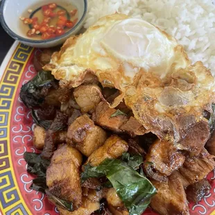Crispy Pork with rice added a fried egg