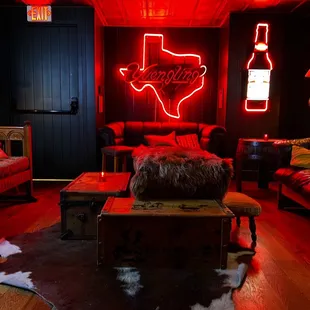 Downstair's area with a jukebox nearby