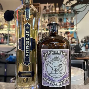 a bottle of monkey&apos;s gin next to a bottle of monkey&apos;s gin