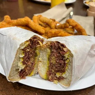 a sandwich cut in half on a plate