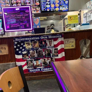a man behind a bar counter