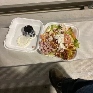 What's left of the dressing not spilled all over the bag