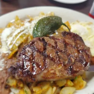 Green chilaquiles with ribeye