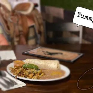 The breakfast bacon &amp; sausage burrito with beans and potatoes was very good.