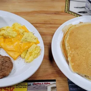 When the order is eggs scrambled with cheese, please, scramble the cheese into the eggs.