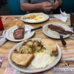 Two eggs and a meat with home fries and toast (ham) and steak and eggs with hash browns!
