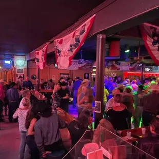 a crowd of people at a rodeo