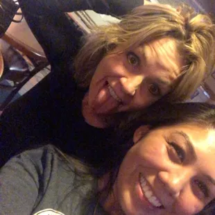 a woman and a man taking a selfie