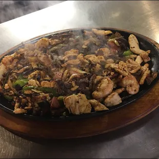 The best well known recommendation!!!!  Shrimp, beef fajita, chicken fajita, sausage,be peppers. Etc