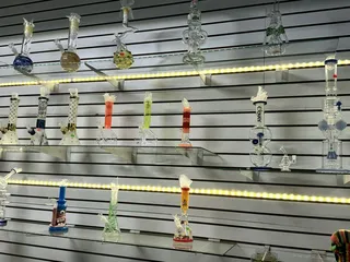 ALKALINE H20 + SMOKE SHOP