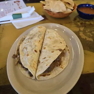 Carne asada on the left and carne guisada on the right