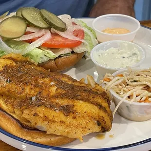 Blackened Grouper sandwich with a side of slaw