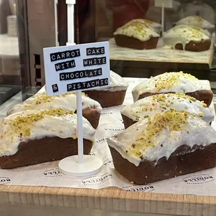 a display of cakes in a bakery