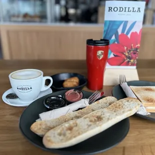 Croquettes, sandwiches, Cappuccino, Oil and Tomato Cereal Toasttoast