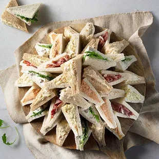 a plate of sandwiches on a table