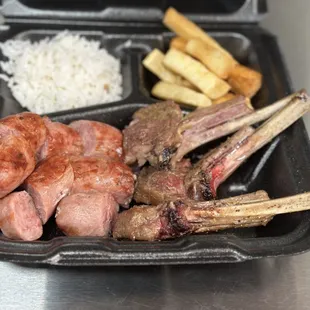 a tray of meat and rice