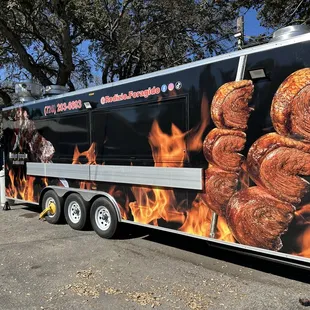 a food truck with flames