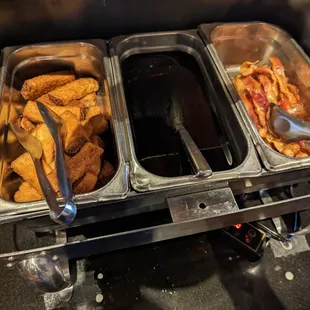 Brunch salad bar hot offerings - french toast sticks, syrup, bacon