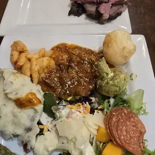 Salad bar and first start of meat serving.