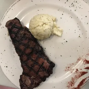 New York strip and grits