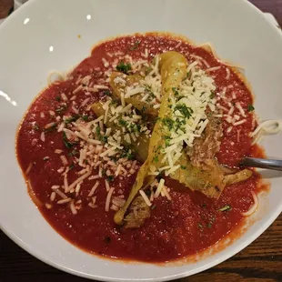 Banana peppers sausage stuffed over angel hair pasta