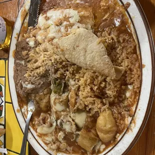 Combo #3 - shredded beef taco, chili relleno, cheese enchiladas, beans and rice